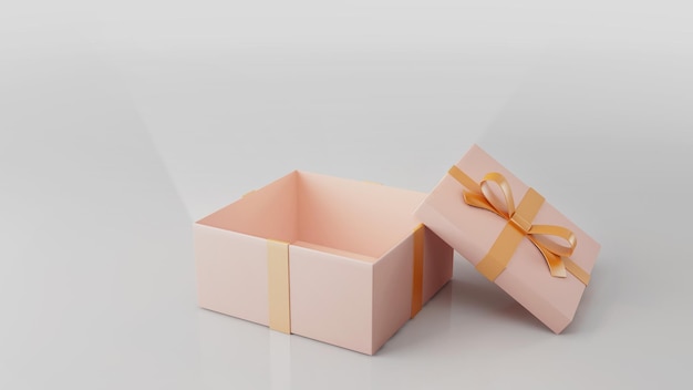 Caja de regalo en blanco con cinta dorada