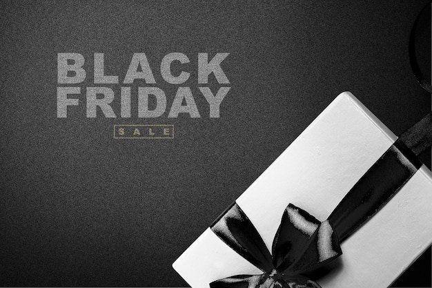 Caja de regalo con cinta negra y texto de venta de Black Friday