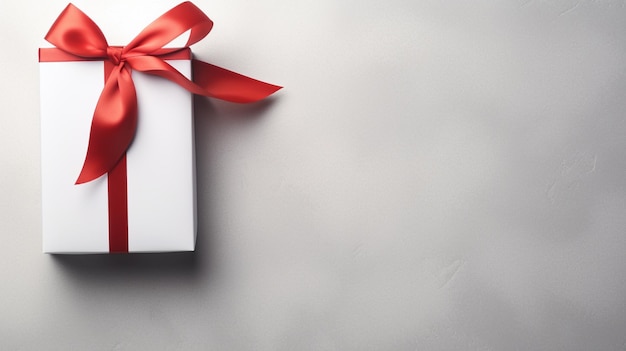 Caja de regalo decorativa con un lazo rojo y una larga cinta Feliz texto del Día de la Mujer Vista superior