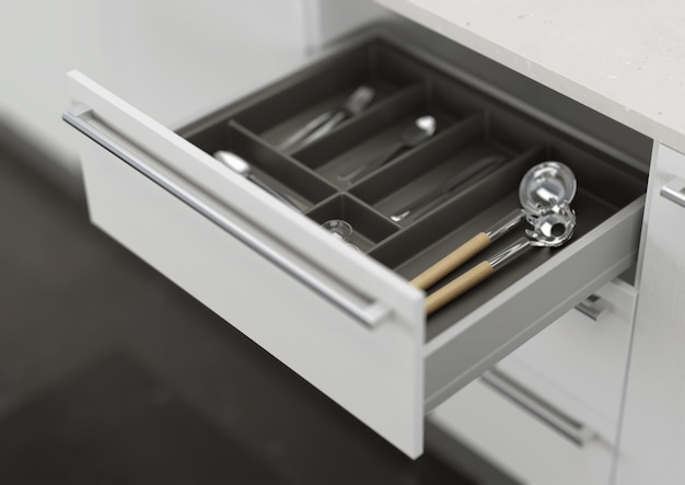 Cajón de cocina abierto con utensilios de cocina. Almacenamiento y organización de la cocina. representación 3d