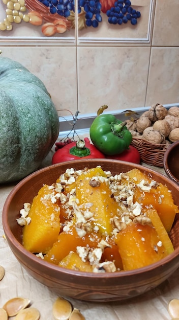 Foto calabaza al horno con nueces y ajo