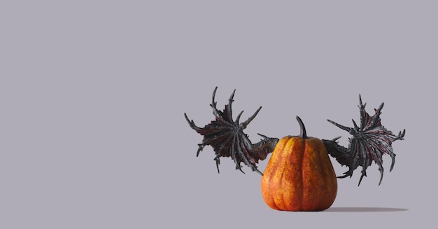 Calabaza naranja con alas negras aterradoras sobre un fondo gris concepto de minimalismo halloween