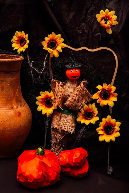 Foto calabazas rellenas de animales girasoles y composición de jarra halloween estilo rústico