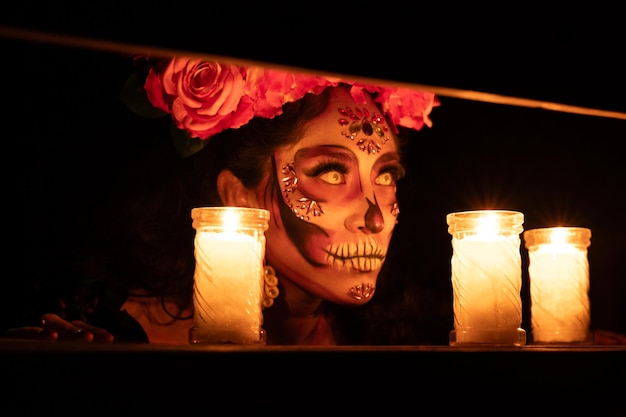 Foto calavera catrina sentada en un trono maquillaje de cráneo de azúcar día de los muertos día de los muertos