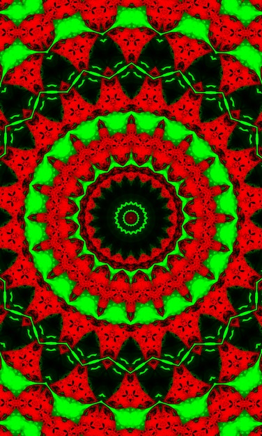 Foto caleidoscopio en colores navideños de rojo y verde. feliz navidad 2022 patrón. imagen vertical.