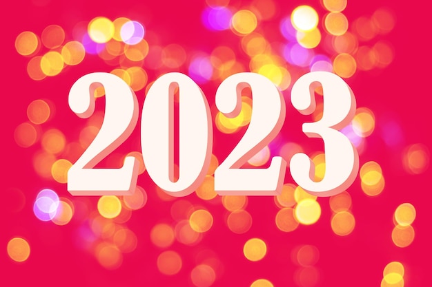 Calendário 2023 Data de Ano Novo 2023 no fundo da Via Magenta com lindo bokeh Elegante cartão de Natal da moda