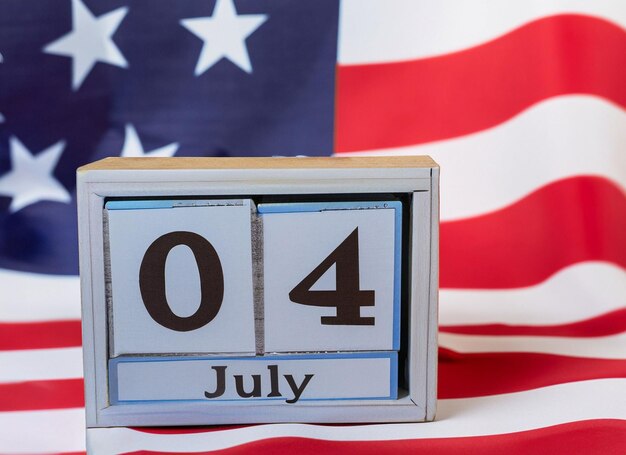 Calendario de madera 4 de julio con una bandera americana generativa ai