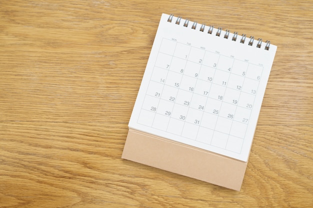 Foto un calendario del mes. utilizando como concepto de negocio de fondo y concepto de planificación