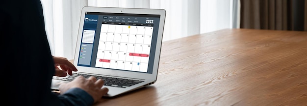 Foto calendário no aplicativo de software de computador para planejamento de programação à moda