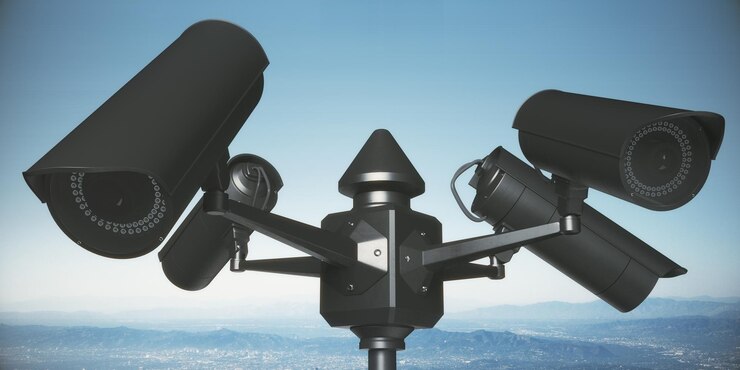 Foto cámaras cctv negras sobre fondo de cielo azul brillante concepto de propiedad representación 3d