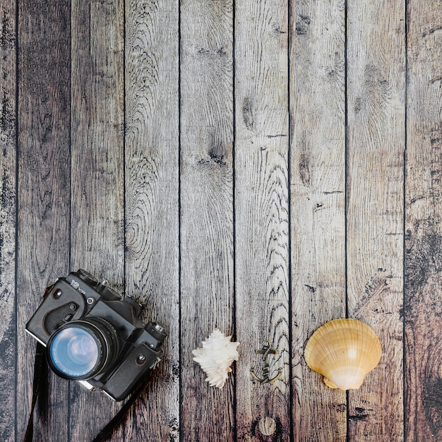 Foto câmera fotográfica e conchas do alto