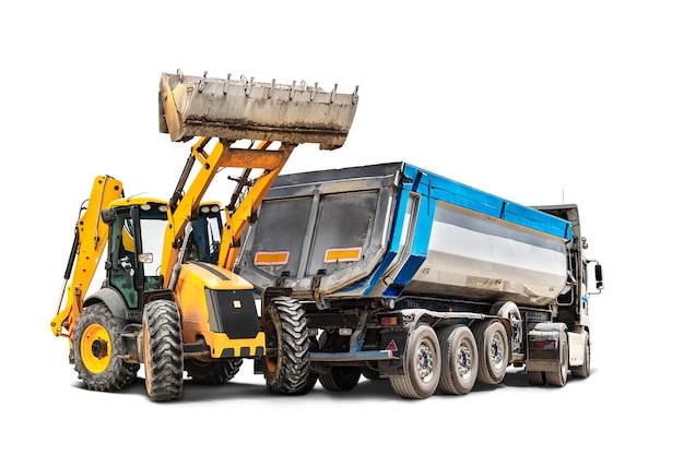 Foto caminhão de mineração e carregador de bulldozer em close-up em um fundo isolado branco equipamento de construção para trabalhos de terra elemento para projeto