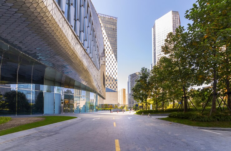 Foto camino vacío con los edificios de la señal de la ciudad moderna del horizonte de la federación de hangzhou, zhejiang, china
