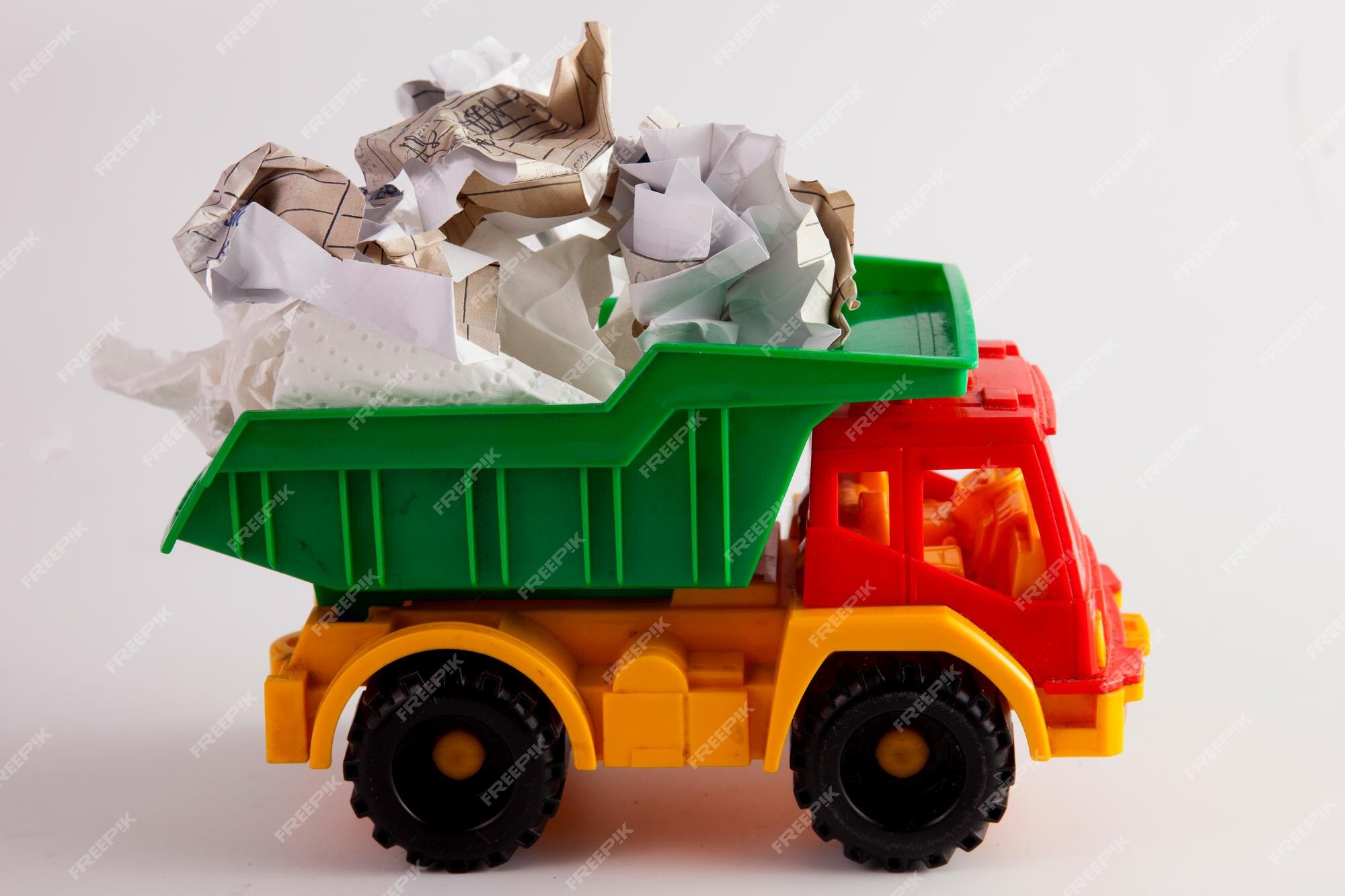 Empresario Abundancia robot Camión de basura para niños de juguete servicio de recolección de basura |  Foto Premium