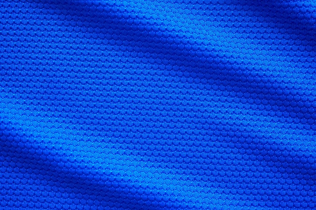 Camisa de futebol azul para roupas, textura de tecido, esportes, roupas de fundo, close-up vista superior