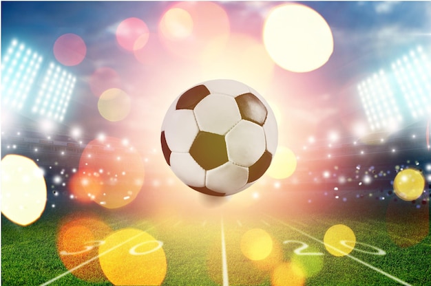 Campo de futebol com visão de close-up de bola de futebol