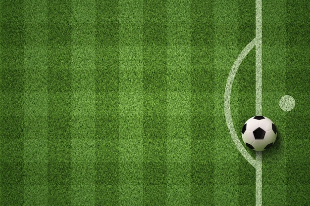 Campo de futebol ou campo de futebol com bola de futebol no fundo da grama verde