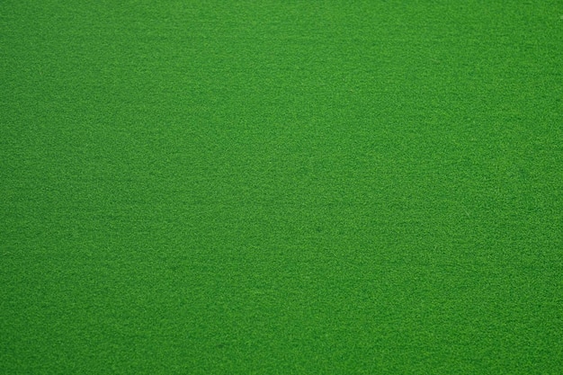 Campo de fútbol con césped verde de fondo