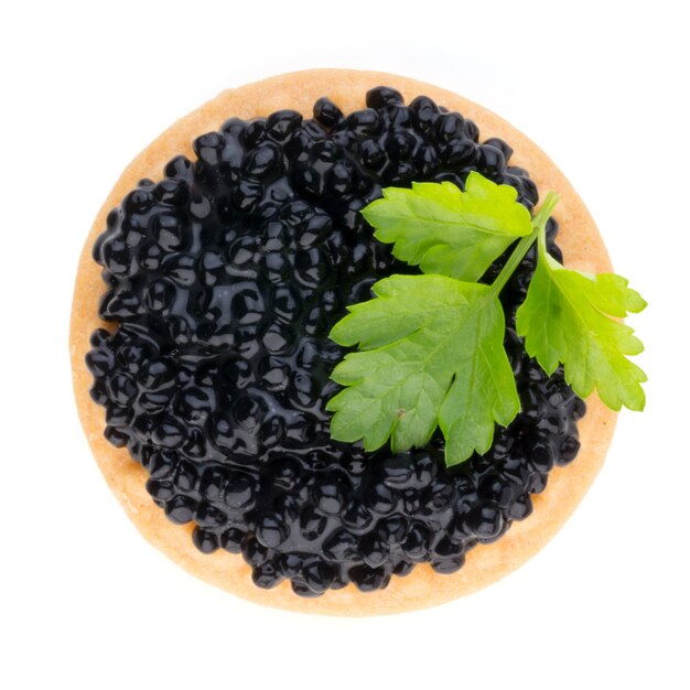 Canapés con caviar de esturión negro y hierbas