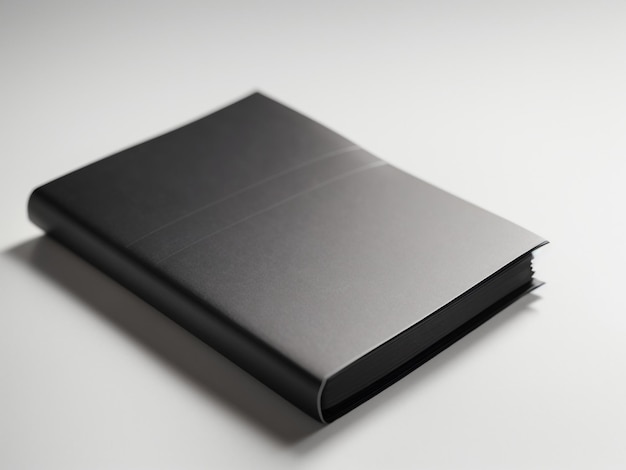 Foto capa de livro vertical de livreto preto em branco na vista branca 1