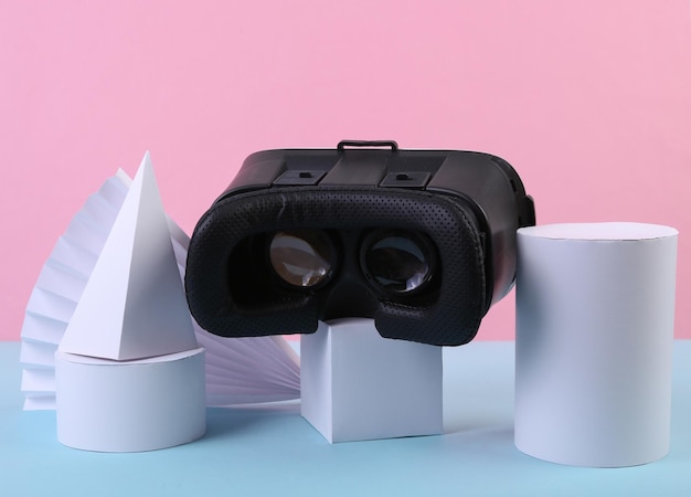 Capacete Vr e formas geométricas em fundo pastel rosa azul Minimalismo Arte conceitual de fundo abstrato Realidade virtual