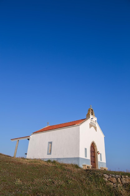 Foto capilla de santa rosa de lima é uma capela laxe na galiza espanha costa paisagem viagem cristã