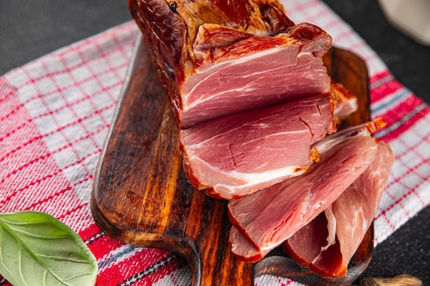 Foto carne de cerdo ahumada cocinar comer aperitivo comida comida bocadillo en la mesa copiar espacio fondo de comida