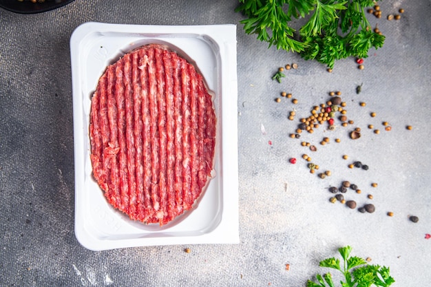 carne moída crua costeleta carne de porco hambúrguer prato fresco refeição comida lanche na mesa espaço de cópia comida