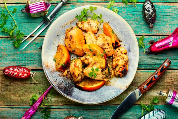 Carne de pollo al horno con naranja.