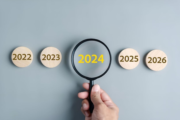 Carregando o progresso de 2023 a 2024 para a contagem regressiva de Feliz Natal e Feliz Ano Novo Planejamento e estratégia de desafio no novo ano 2024 Conceito