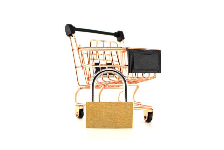 Foto carrito de compras con bloqueo que representa la seguridad y la protección de los entornos de compras en línea o minoristas