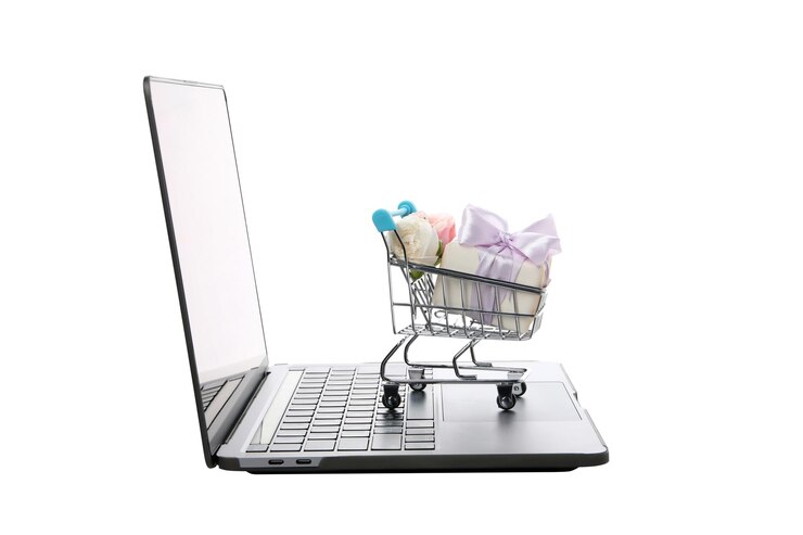Foto carrito de compras png con computadora portátil y flores aisladas sobre fondo blanco