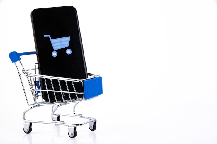 Foto carrito de compras, teléfono móvil, icono de carrito de compras, comercio electrónico, comercio digital, venta minorista en blanco