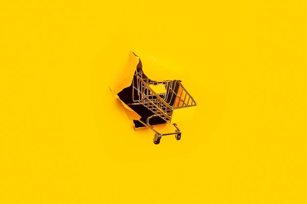 Carrito de compras vacío perfora amarillo