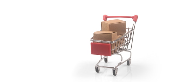 Carro de compras de juguete con concepto de compras y entrega de cajas. Tendencia de la sociedad de consumo