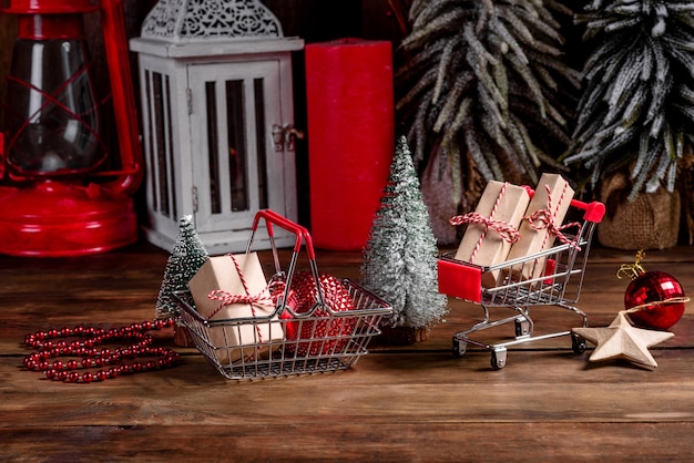 Foto carro de compras con regalos de navidad