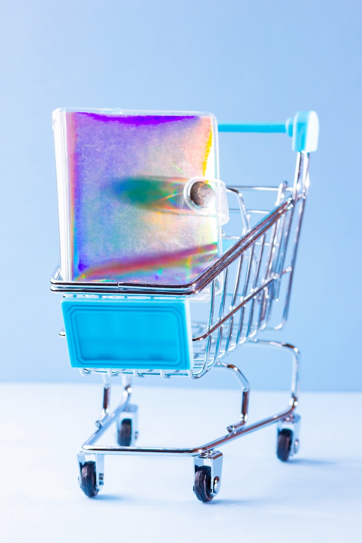 Foto carro de compras con útiles escolares