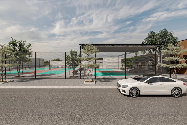 Foto carro de luxo estacionado perto de um campo de esportes ao ar livre em um cenário urbano moderno