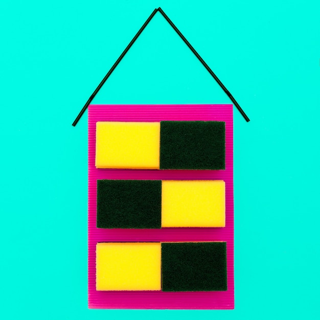 Casa hecha de esponjas. Diseño de arte minimalista.