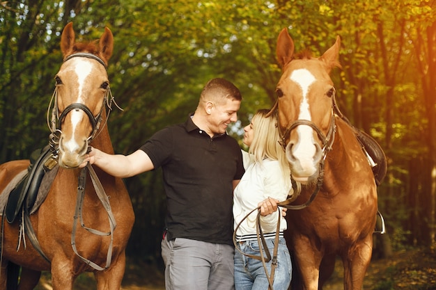 casal com cavalos