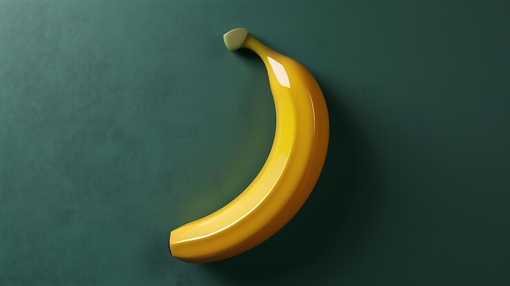 Foto una cáscara de plátano está colgada en una pared verde