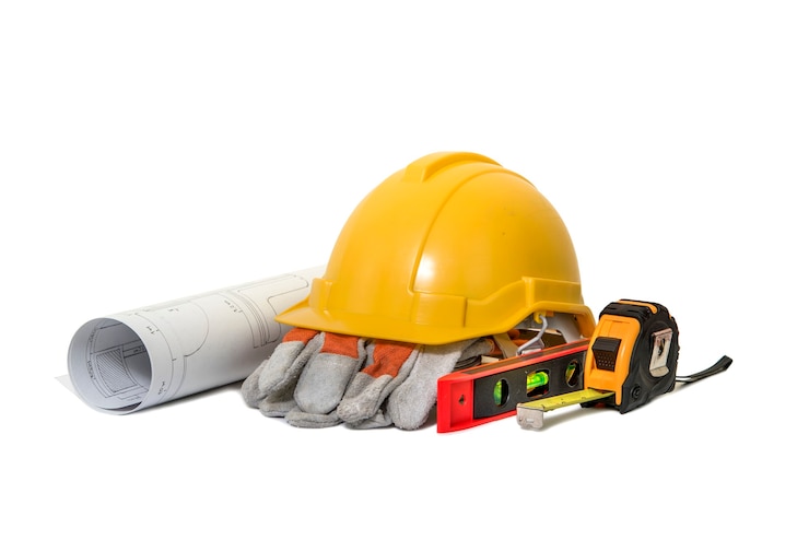 Foto casco de seguridad blueprint yellow para construcción y herramientas sobre fondo blanco.