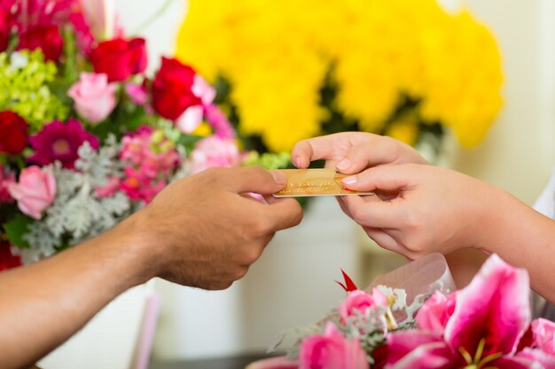 Cashless - Compra de flores con tarjeta de crédito.
