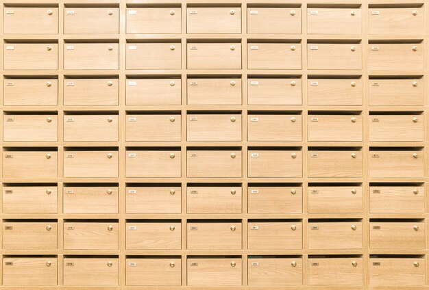 Foto casillero de madera mailboxes postales para mantener su información, facturas, tarjetas postales, correos electrónicos, etc.