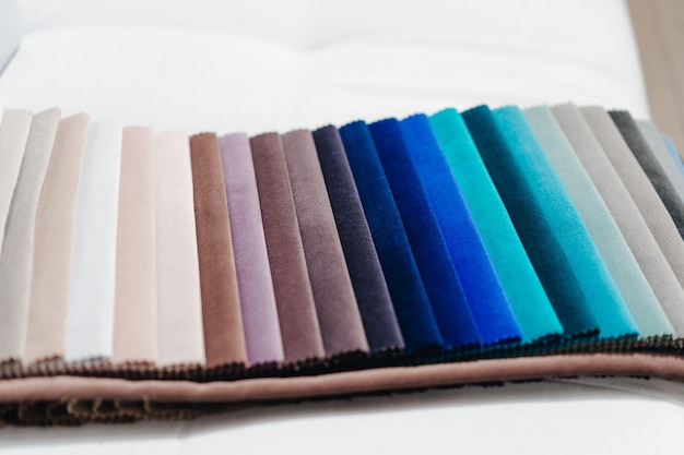Catálogo de tejidos Catálogo de muestras de telas multicolores Fondo de la industria textil Tela de algodón de colores Catálogo de tejidos Selecciona el color del sofá Fondo de la industria textil Palet