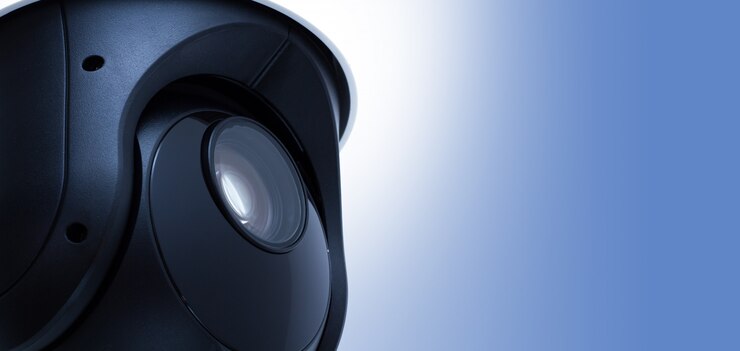 Foto cctv cámara de seguridad de video con espacio en azul.