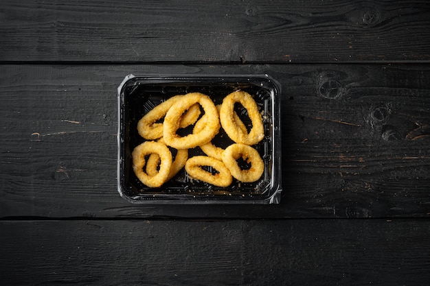 Cebolla cruda crujiente frita o paquete de plástico de anillo de calamares