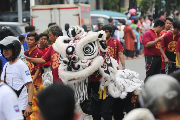 Foto celebración de la danza del león del año nuevo chino en el festival