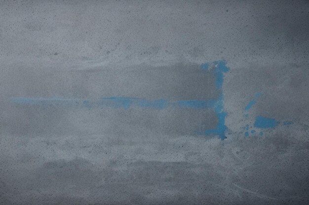 Cemento horizontal amplio de color azul oscuro y superposición sobre fondo de pizarra