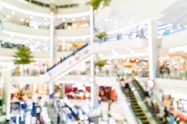 Centro comercial borroso y tienda minorista